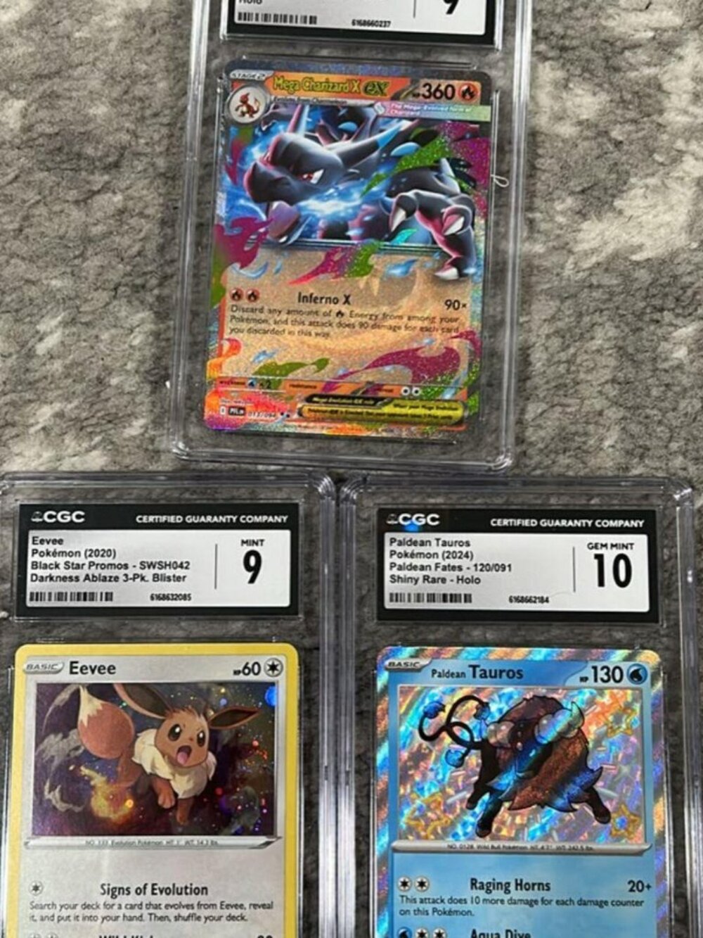 CGC Graded Pokémon Card Lot – Mega Charizard X ex, Eevee & Paldean Tauros